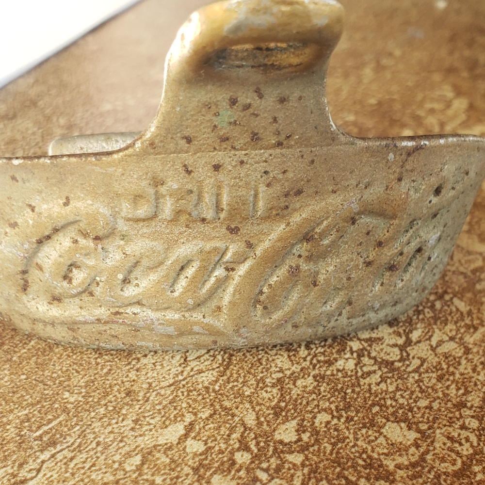 Coca-Cola bottle cap remover